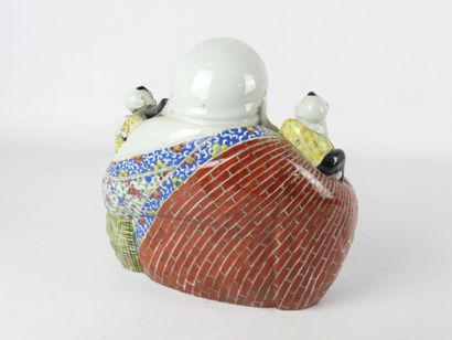 CHINA: Budai Buddha in porcelain and polychrome...