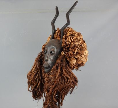 AFRICA. Dance mask with face surmounted by...