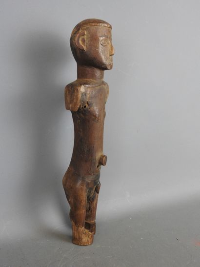 IVORY COAST. Male statue. H. 32.5 cm. Damage...