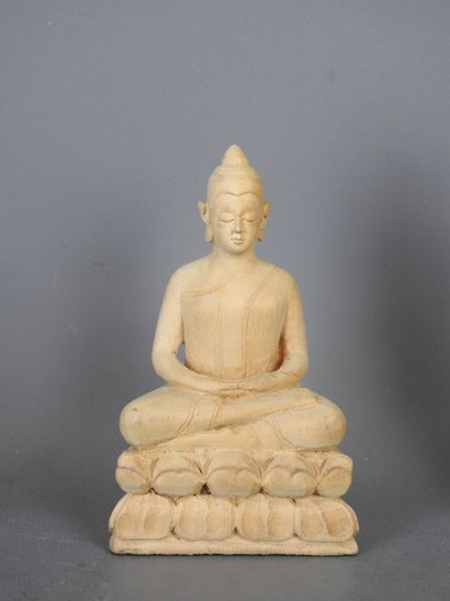Four wooden STATUETTES representing deities...