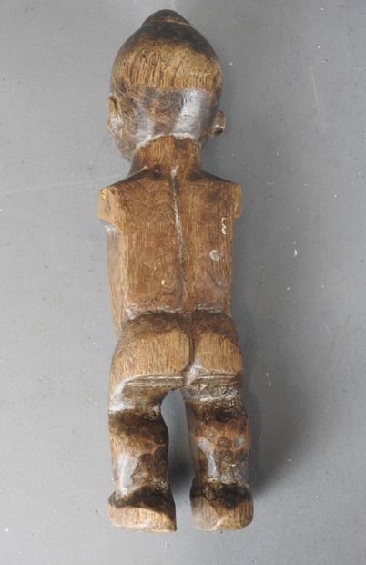 TOGO. Female statuette without arms. H. 25...