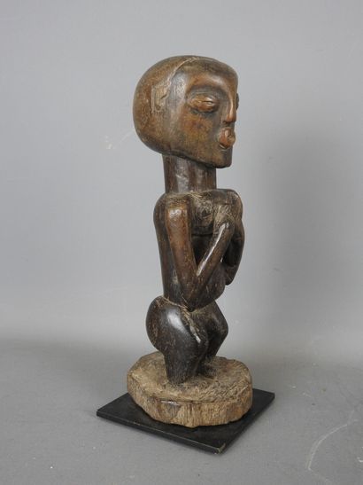 HOLO, République Démocratique du Congo.
Bois...