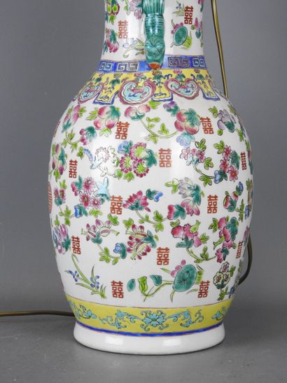 CHINA. Porcelain baluster lamp decorated...