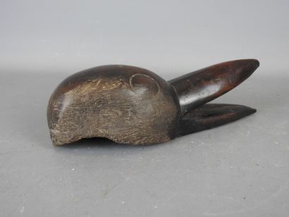 DAN, IVORY COAST. Diminutive mask with bird's...