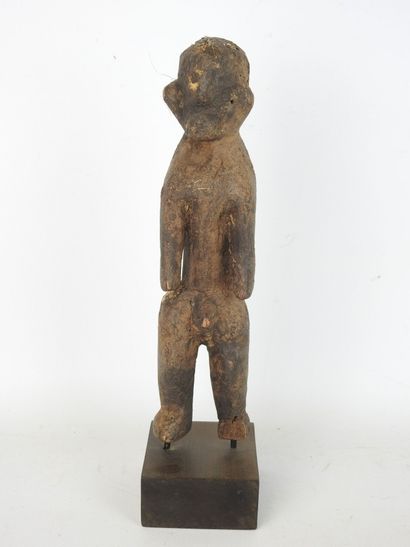 KEAKA, NIGERIA: Male statuette in carved...