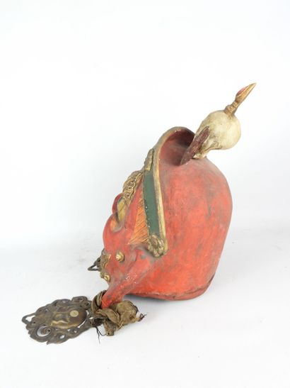 CHINA: Wood and metal mask representing the...