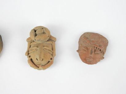 FOUR pre-Columbian FIGURES in stone and clay....