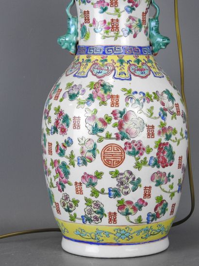 CHINA. Porcelain baluster lamp decorated...