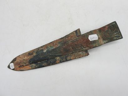 Halberd with socket decorated in relief....