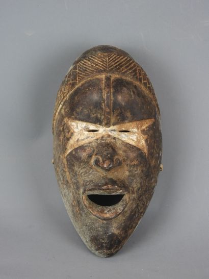 Dance mask marked with a white band across...