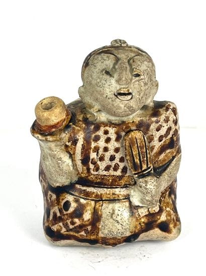 THAILAND: Stoneware figure. 15th century....
