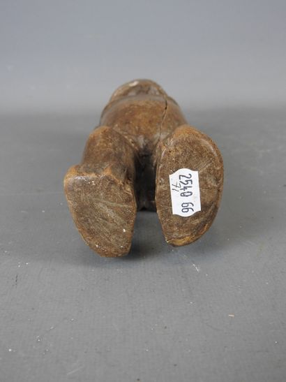 TOGO. Female statuette without arms. H. 25...