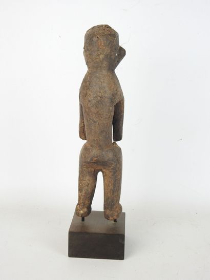 KEAKA, NIGERIA: Male statuette in carved...