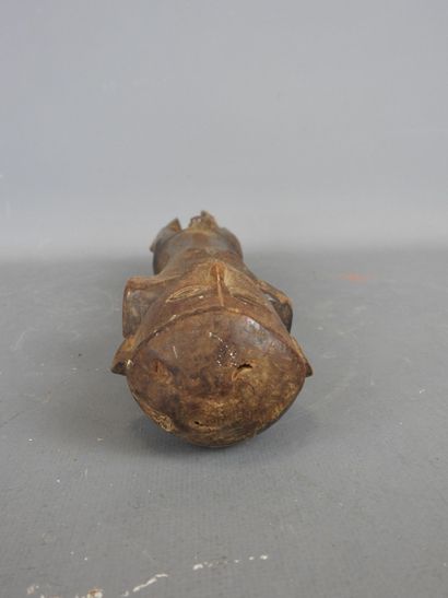 IVORY COAST. Male statue. H. 32.5 cm. Damage...