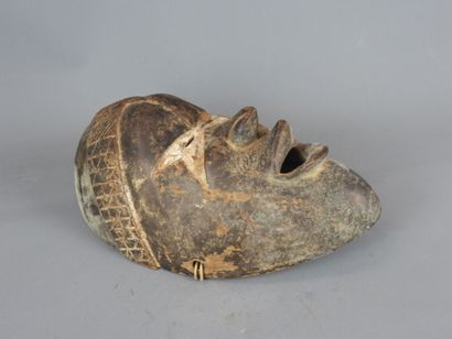 Dance mask marked with a white band across...