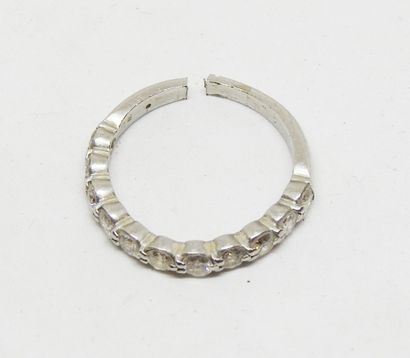 Half wedding band in platinum set with brilliant-cut...