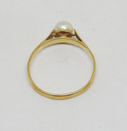 Bague de jeune fille monture or 18 K ornée...