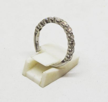 Half wedding band in platinum set with brilliant-cut...
