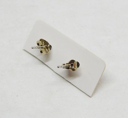 Pair of 18K gold stud earrings set with 2...
