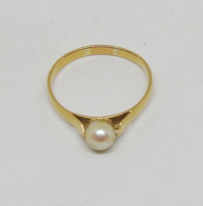 Bague de jeune fille monture or 18 K ornée...