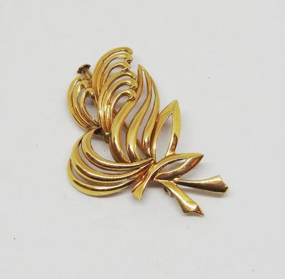 Broche volute or 18 K
H. : 4,5 cm
Poids total...