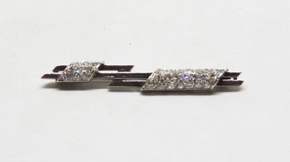 Line brooch in 18 K gold with two pavé-cut...