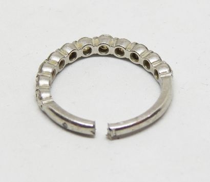 Half wedding band in platinum set with brilliant-cut...
