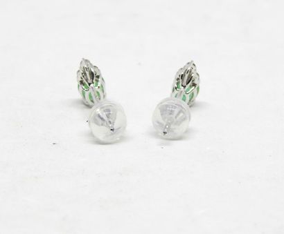 Pair of platinum ear studs set with 2 oval-cut...
