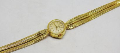 LONGINES
Montre de dame toute or 18K.
Poids...