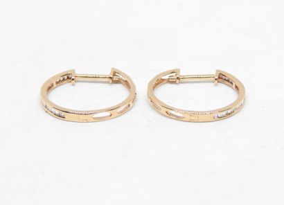 Pair of 18K gold hoop earrings set with 0.15...