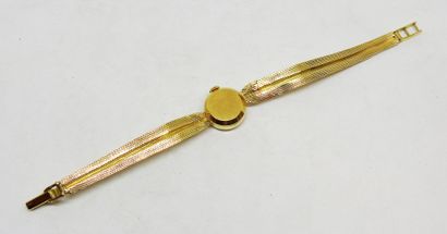 LONGINES
Montre de dame toute or 18K.
Poids...