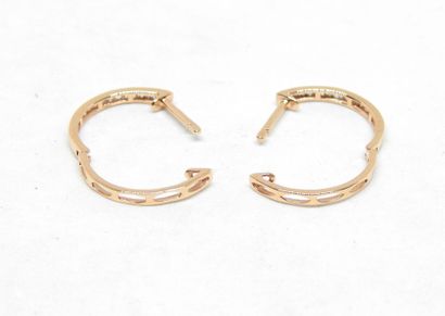 Pair of 18K gold hoop earrings set with 0.15...