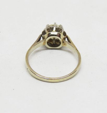 Sunburst ring in 18 K gold and platinum set...