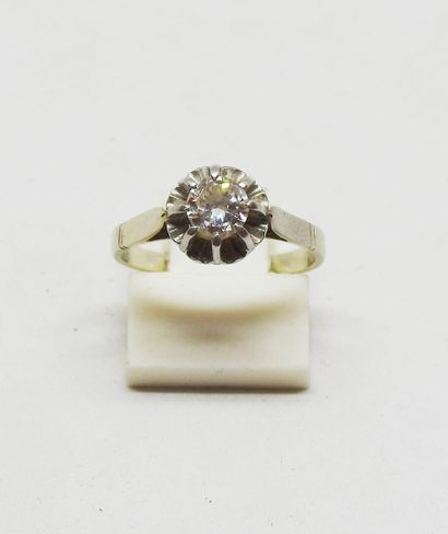 Sunburst ring in 18 K gold and platinum set...