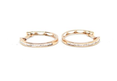 Pair of 18K gold hoop earrings set with 0.15...