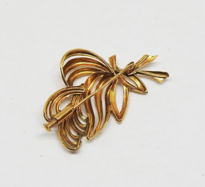 Broche volute or 18 K
H. : 4,5 cm
Poids total...