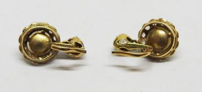 Pair of 18K gold earrings set with white...