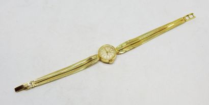 LONGINES
Montre de dame toute or 18K.
Poids...