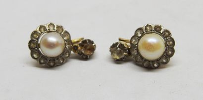 Pair of 18K gold earrings set with white...