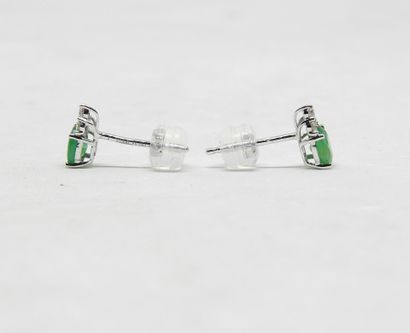 Pair of platinum ear studs set with 2 oval-cut...