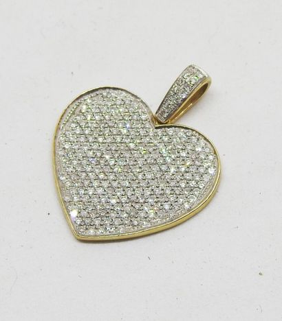 Heart pendant set in 18K gold, entirely paved...