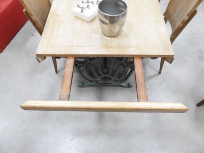 IMPORTANT DINING ROOM TABLE in green lacquered...