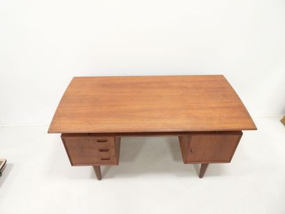 Scandinavian teak desk opening with a door...