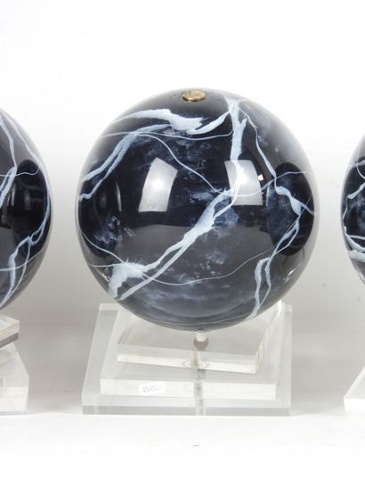 Three resin Balls on Plexiglas base. H. 29...