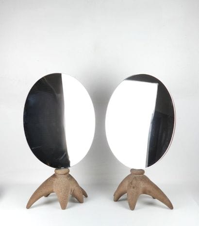 PAIR OF MIRRORS, oval mirror on resin support,...
