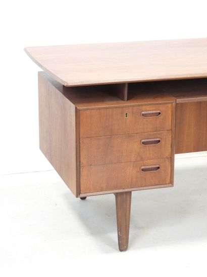 Scandinavian teak desk opening with a door...