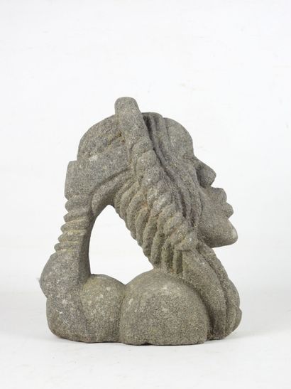 AFRICAN HEAD in carved stone. H. 28 cm.