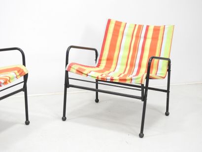 SUEDE: Pair of tubular metal garden armchairs...