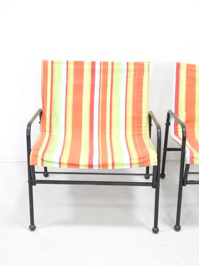 SUEDE: Pair of tubular metal garden armchairs...