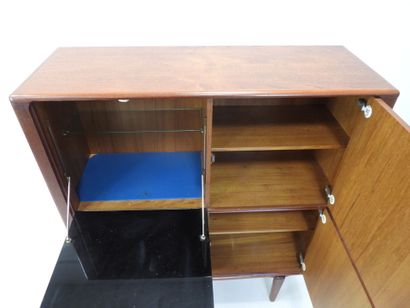 Scandinavian rosewood bar cabinet opening...